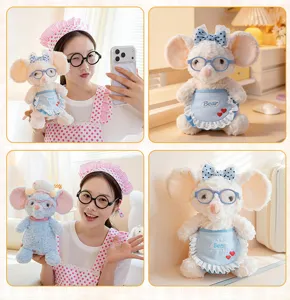 Cute baking mouse plush toy wearing glasses and blue apron with bow detail