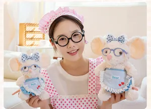 Asian female model holding cute baking mouse plush dolls with blue aprons and bowties