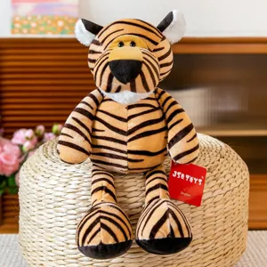Adorable striped tiger plush toy sitting on a woven pouf in a cozy home setting