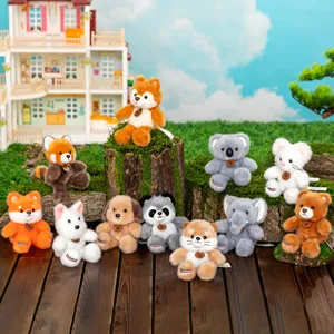 Set of forest animal plush keychains with cute fox, panda, and koala designs on wood