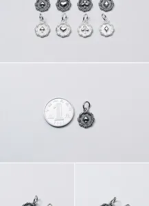Detailed macro view of S925 silver vintage poker suit charms shown with coin for scale