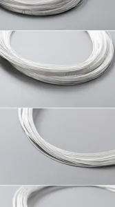 Macro detail of coiled S925 sterling silver wire for DIY jewelry making projects