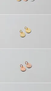 Close-up detail of S925 silver 6mm glitter sand disc pendants in gold and rose gold