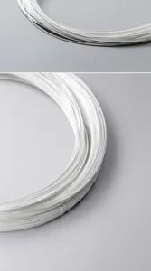 Close-up of S925 sterling silver wire coil for handmade DIY jewelry making.