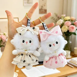 Cute pastoral style plush lamb keychains wearing polka dot dresses and bows for girls