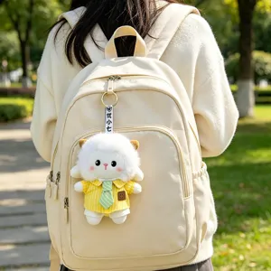 Minimalist cream white backpack for women with a cute plush sheep pendant toy