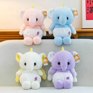 Set of four cute pastel elephant plush toys with unicorn horns and wings sitting on a sofa