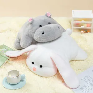 Soft plush animal pillows featuring cute hippo and long-eared bunny designs