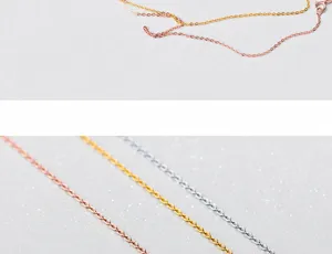 Vista macro dettagliata delle catene a O in argento sterling S925 in oro e oro rosa
