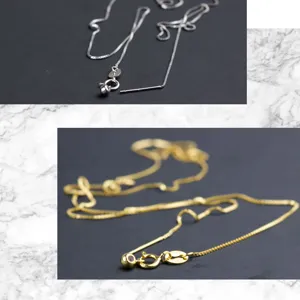 Dettaglio di catene box in argento S925 e placcate oro con punte ad ago per gioielli DIY