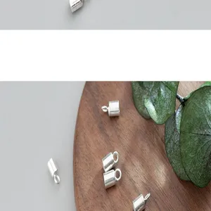 Detailed macro view of 925 sterling silver cord end caps for DIY jewelry making