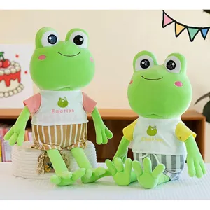 Adorable green summer frog plush dolls wearing colorful striped shirts and shorts