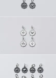 Detail view showing S925 sterling silver playing card suit pendants with retro finish
