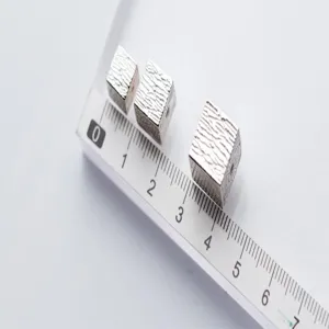 S925 sterling silver textured square spacer beads shown with ruler for size reference
