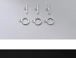Detail showing three pairs of silver-plated S925 metal OT clasps for jewelry DIY.