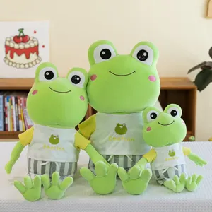 Set of three cute green frog plush toys wearing shirts and shorts, perfect for kids