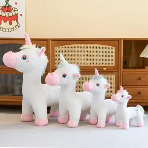 Set of four white unicorn plush toys with rainbow manes in various sizes for girls' gifts