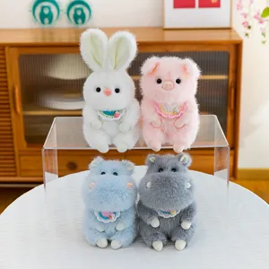 Adorable plush animal keychain dolls including white rabbit pink pig and colorful hippos