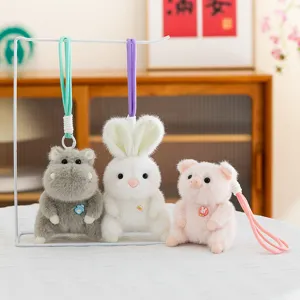 Cute plush animal keychain charms featuring hippo, rabbit, and pig for bag decoration