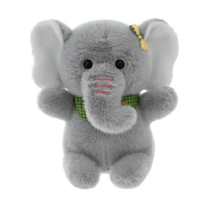 Cute gray plush elephant toy wearing a green checkered scarf and a yellow bow