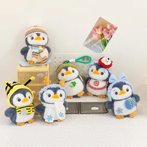 Adorable plush penguin keychains featuring various cute cartoon costumes and accessories