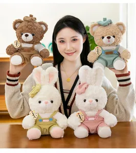 Detailed view of plush teddy bears and rabbits wearing colorful corduroy overalls