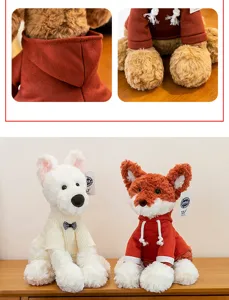 Close-up detail of plush fox and dog stuffed animals wearing tiny hoodies and sweaters