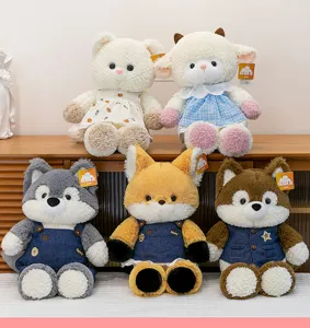 Detailed view of plush animal collection featuring fox and husky in cute outfits