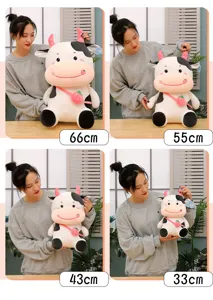 Cute cow plush toy with strawberry bag shown in four sizes from 33cm to 66cm height.
