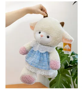 Close-up of a cute Paopao series sheep plush toy wearing a blue checkered lace dress