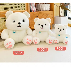 Detailed view of three white butterfly teddy bears in 30cm, 40cm, and 55cm sizes