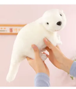 Cute white sea otter plush toy detail view, soft stuffed animal doll pillow for kids and room decor.