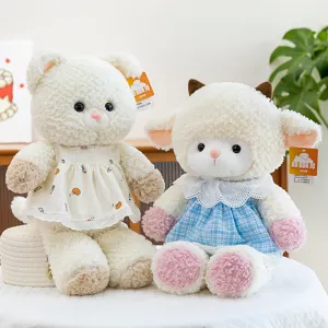 Pair of cute cat and sheep plush toy dolls in patterned dresses, ideal for gift giving