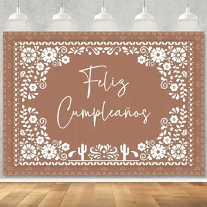 Mexican-style brown birthday party backdrop with white floral and cactus patterns