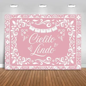 Pink Mexican theme party backdrop with Cielito Lindo text and white floral folk art design