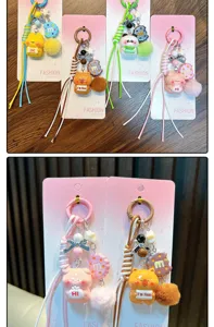 Variety of cute animal keychains featuring panda and bear with funny signboards on cards