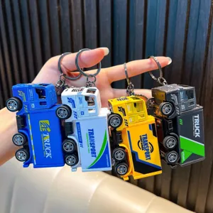 Set of four alloy truck container keychains with pull-back function in various colors.