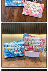Close-up of 26-key mechanical keyboard fidget toys in blue and pink themes.