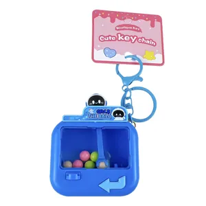 Mini-Blau-Cartoon-Greifautomat-Schlüsselanhänger Stressabbau-Spielzeug mit bunten Bällen