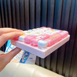 Pink 26-key mechanical keyboard fidget toy keychain decorated with cute cartoon keycaps