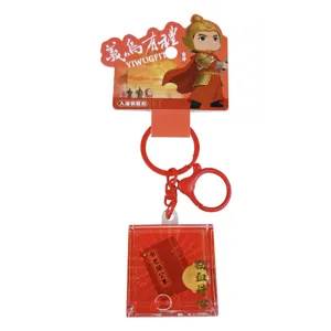 Porte-clés créatif en bouteille de sable mouvant avec liquide rouge et figurine