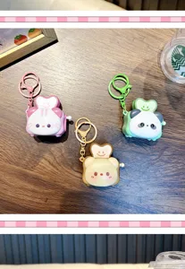 Lindos llaveros de tostadora de animales en diseños de conejo rosa, panda y oso pardo