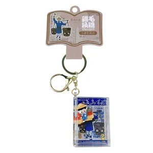 Schattige vloeibare sleutelhanger met drijvende glitters en souvenirfiguurtje