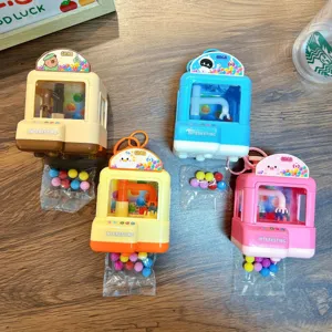Leuchtende Mini-Greifautomat-Schlüsselanhänger in vier Farben für Kinder zum Stressabbau