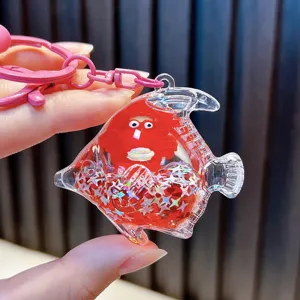 Cartoon red fish oil-filled liquid keychain with glitter and character doll for bag