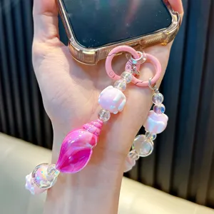 Kralen telefoonriem met roze zeeschelp en schattige pootjes voor telefoonhoesje accessoires.