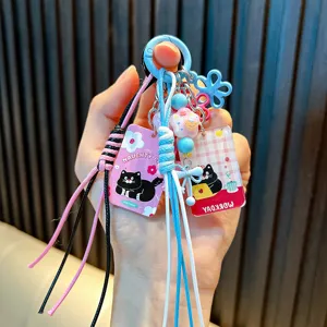 Cute cartoon cat keychain with colorful braided rope and flower charm gift for girls