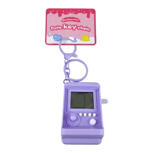 Purple mini handheld brick game console keychain, electronic educational toy for kids gift