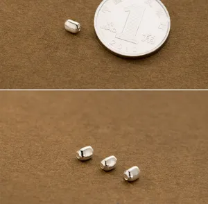 Macro view of S925 sterling silver geometric spacer beads for DIY jewelry making