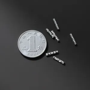 Close-up of 925 sterling silver diamond-cut tube spacer beads for DIY jewelry making